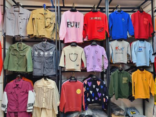 عکس فروشگاه پوشاک بچه گانه دُردونه