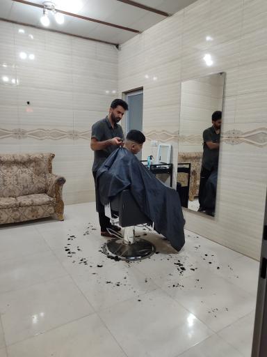 عکس پیرایش مومن تاجدینی