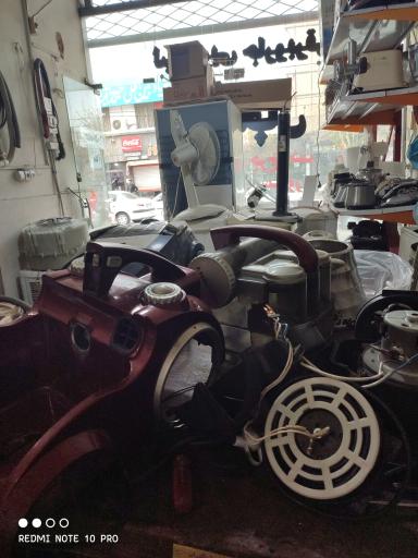 عکس تعمیرات لوازم خانگی آگاه