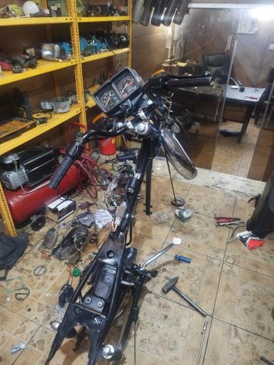 عکس تعمیرگاه موتورسیکلت عافیل