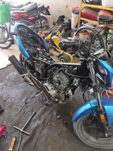 عکس تعمیرگاه موتورسیکلت عافیل