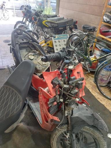 عکس تعمیرگاه موتورسیکلت عافیل