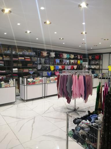 عکس فروشگاه پوشاک لبخند