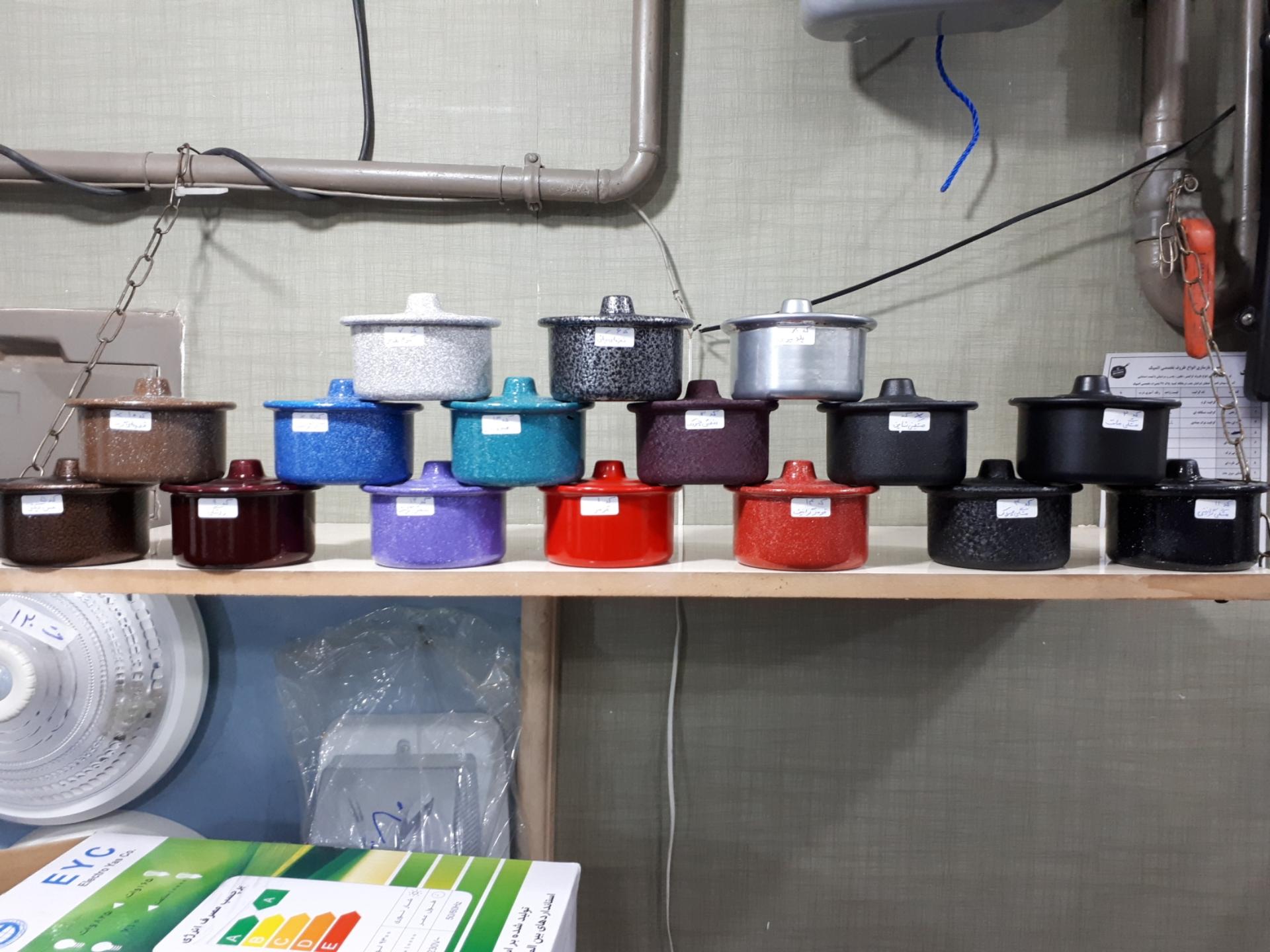 عکس بازسازی ظروف چدنی المپیک