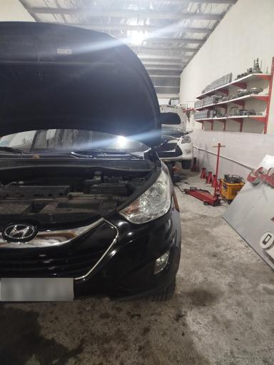 عکس تعمیرگاه گیربکس اتوماتیک احمدی