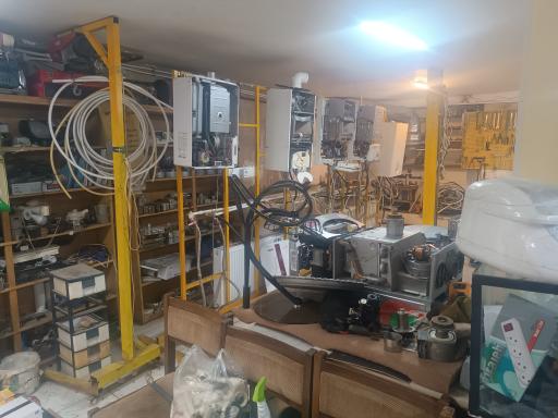 عکس تعمیرگاه و فروش قطعات تخصصی پکیج