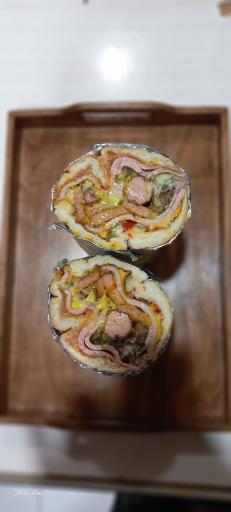 عکس پیتزا و فست فود جناب خان 