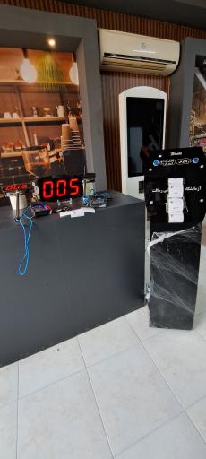 عکس نمایندگی تجهیزات فروشگاهی و اداری دکان چین