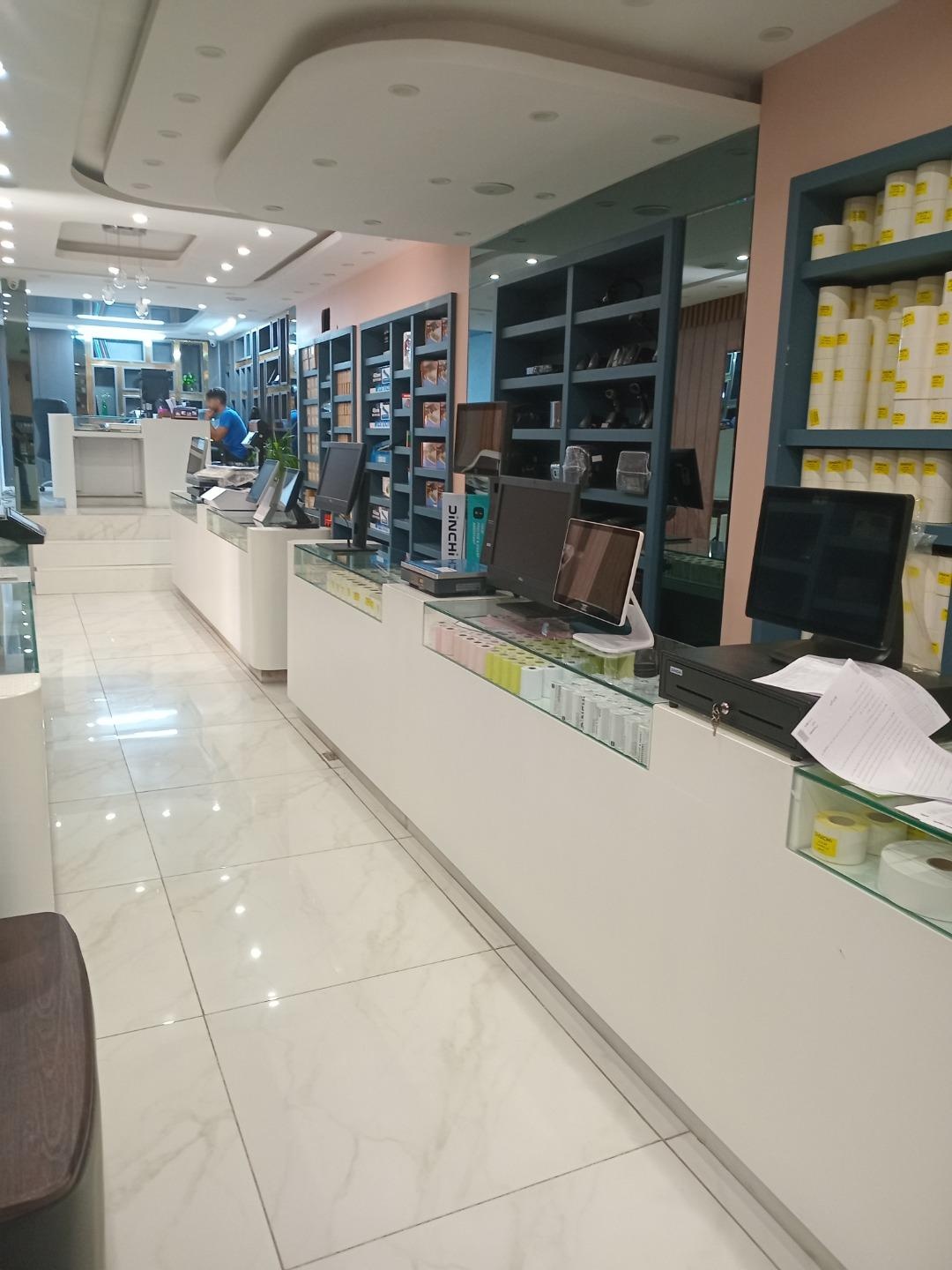 عکس نمایندگی تجهیزات فروشگاهی و اداری دکان چین