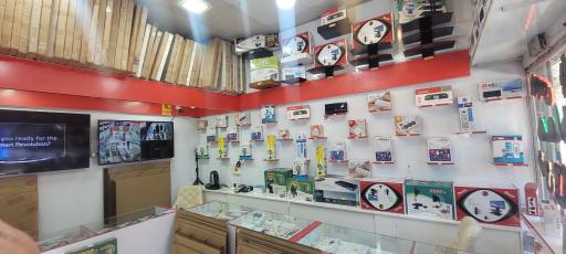 عکس نمایندگی محافظ صفحه و پایه دیواری تلویزیون