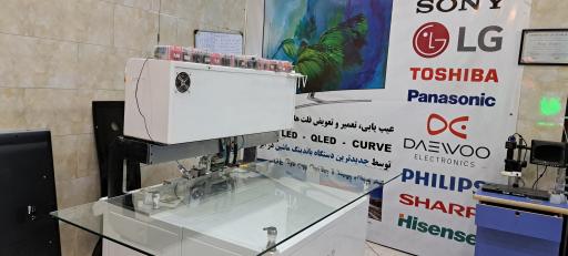 عکس تعمیرات تلویزیون ذوقی