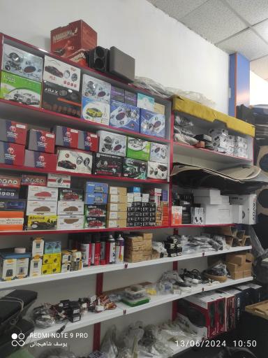 عکس دزدگیر، ردیاب ،قفل مرکزی و تعمیرات شیشه بالابر