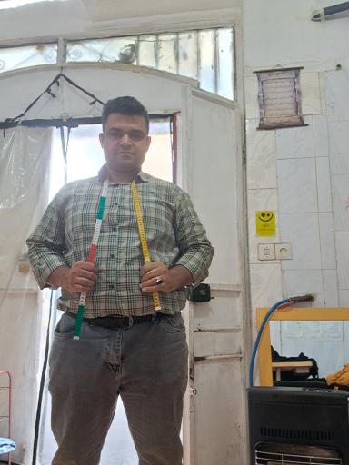 عکس مغازه خیاطی رضا