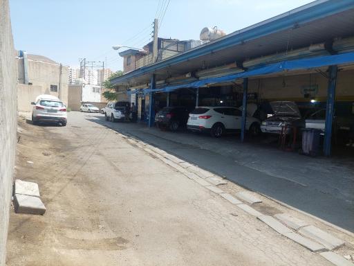 عکس لوازم یدکی و تعمیرگاه فریبرز