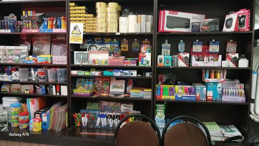 عکس خدمات کامپیوتری و لوازم التحریر تنبل