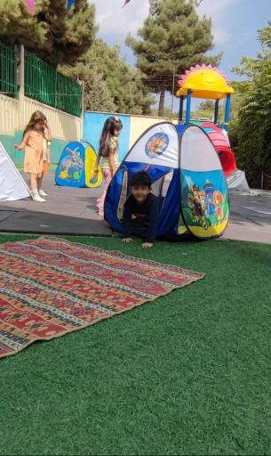 عکس مهد کودک چتر سفید