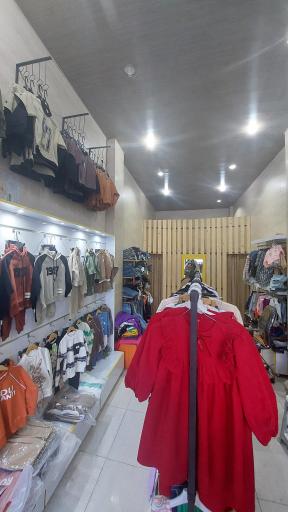 عکس فروشگاه لباس بچگانه سان کیدز