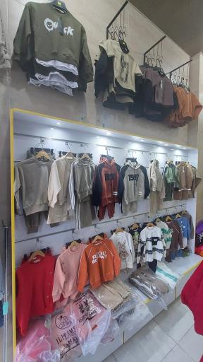 عکس فروشگاه لباس بچگانه سان کیدز