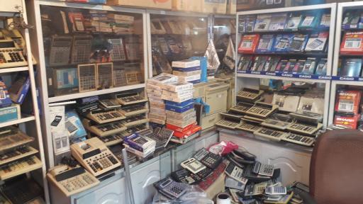 عکس تعمیر ماشین حساب خراسانی