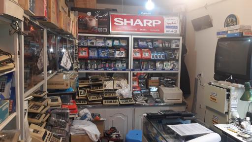 عکس تعمیر ماشین حساب خراسانی