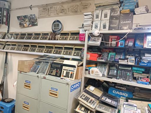 عکس تعمیر ماشین حساب خراسانی