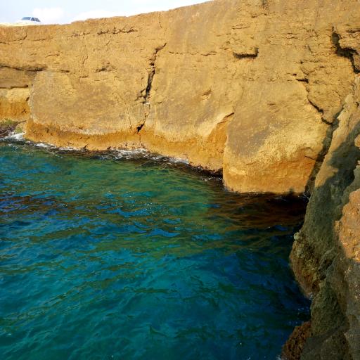 عکس ساحل صخره ای نایبند