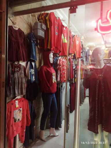 عکس پوشاک دینالند 