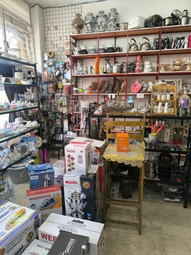 عکس گالری قلی زاده(انواع پوشاک و لوازم خانگی)