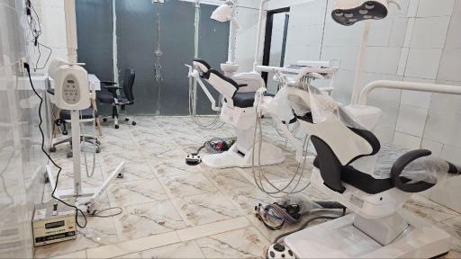 عکس دندانپزشکی دکتر اعظم اکبر فرخانی