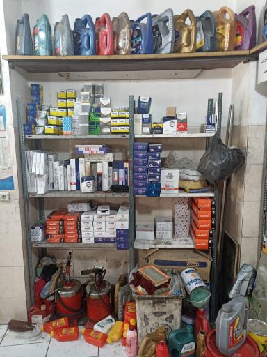 عکس تعویض روغن و اتو سرویس مهدی