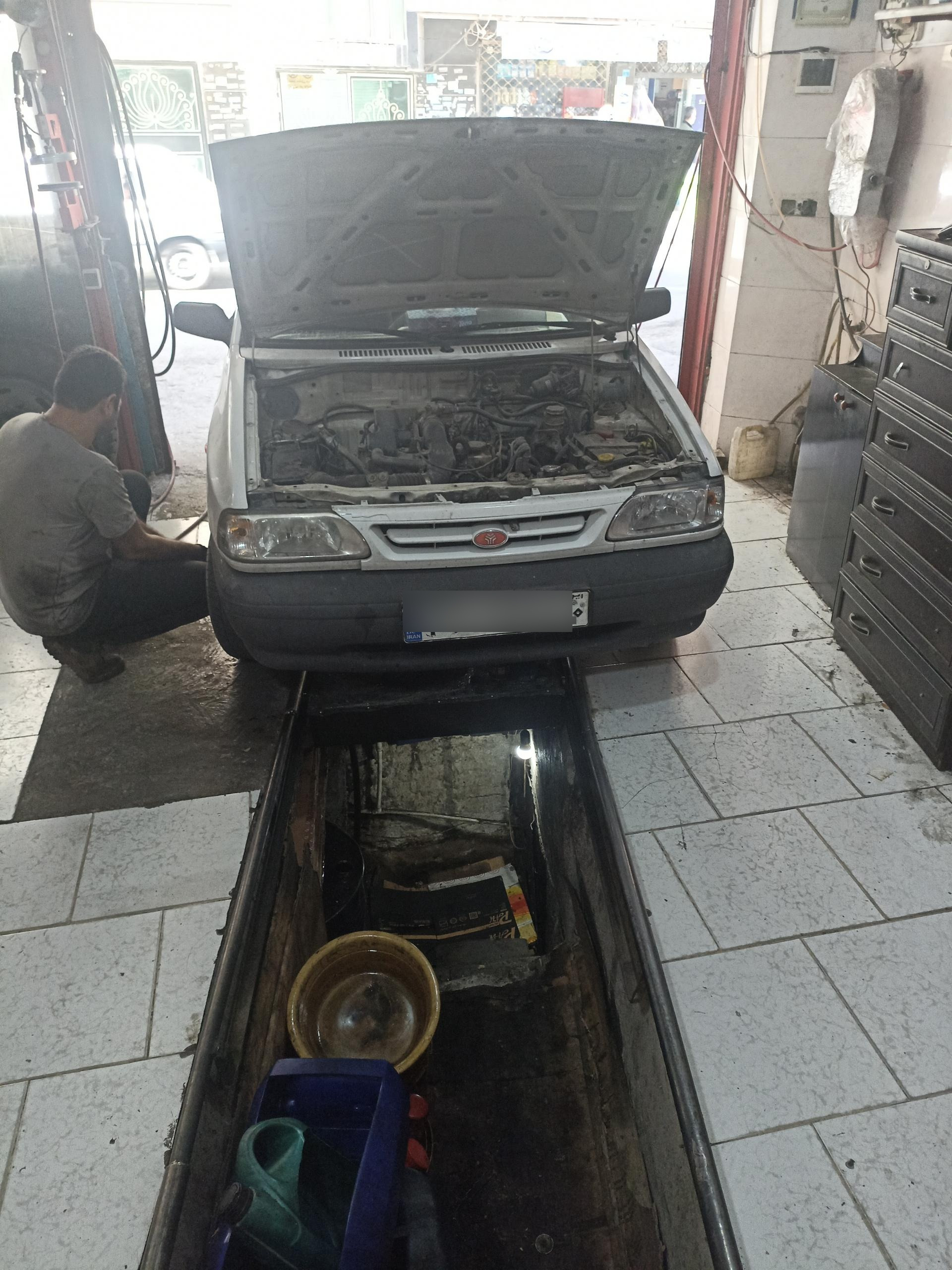 عکس تعویض روغن و اتو سرویس مهدی