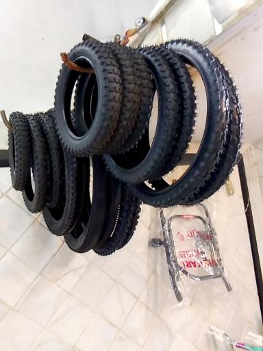 عکس فروش و تعمیر دوچرخه رضا