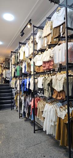 عکس پوشاک کودک پاپیون