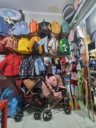 عکس سیسمونی و پوشاک کودک و اسباب بازی آزادی