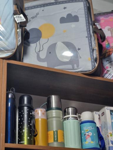 عکس سیسمونی و پوشاک کودک و اسباب بازی آزادی