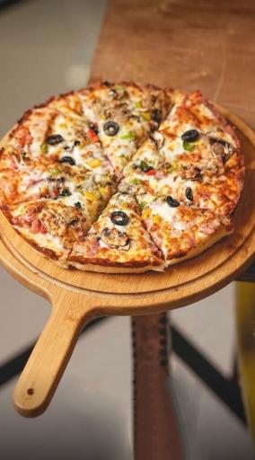عکس مجموعه غذایی پیتزا پانیذ ( شعبه ابوریحان )