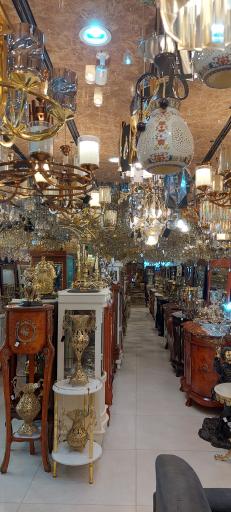 عکس لوستر و آینه کنسول برنزی قصرشعله