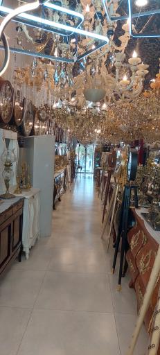 عکس لوستر و آینه کنسول برنزی قصرشعله