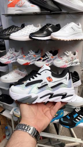 عکس فروشگاه کفش زنانه رفاه