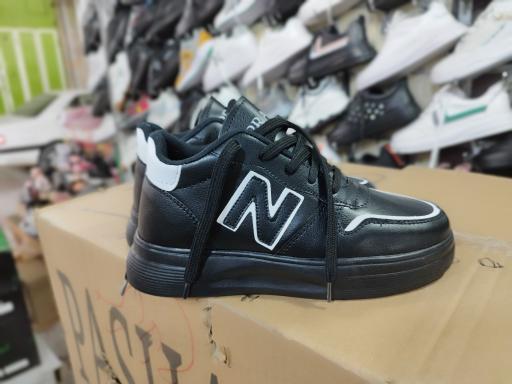 عکس فروشگاه کفش زنانه رفاه