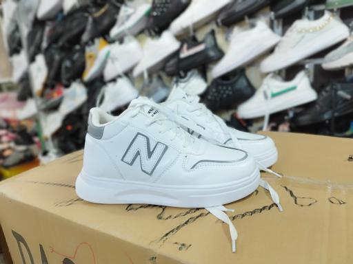 عکس فروشگاه کفش زنانه رفاه