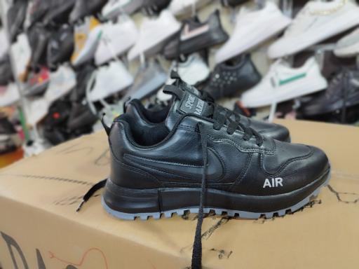 عکس فروشگاه کفش زنانه رفاه