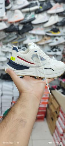 عکس فروشگاه کفش زنانه رفاه