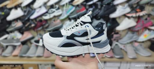 عکس فروشگاه کفش زنانه رفاه