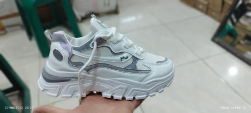 عکس فروشگاه کفش زنانه رفاه