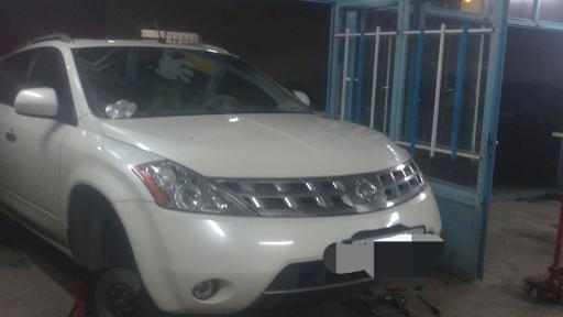 عکس تعمیرگاه جلوبندی