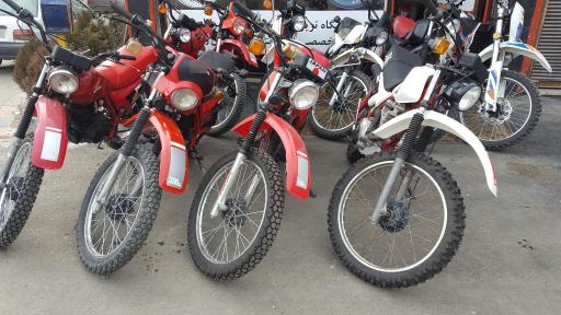 عکس تعمیرگاه و فروشگاه موتور سیکلت تریل سواران شریفی