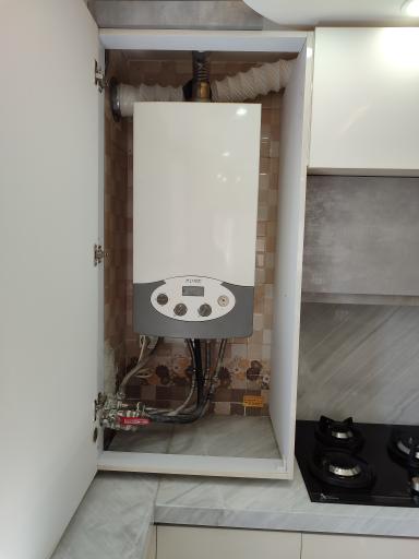 عکس تعمیرات پکیج نمایندگی ایران رادیاتور و بوتان