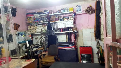 عکس تعمیرات کیف و کفش داودی