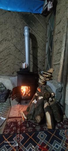 عکس مسافرخانه چوبی مهیار